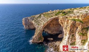 The Blue Grotto at Zurrieq (Malta) with Filfla in the background.