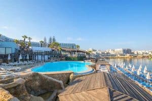 The outdoor seafront pool at Dolmen Hotel Malta in Bugibba/Qawra.