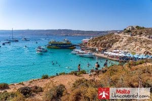 The Sea Adventure Excursions boat moored at the Blue Lagoon jetty in Comino on one of its trips.