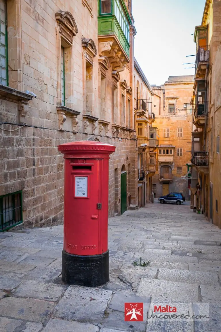 A small street in Valletta with an obvious trace of British history.